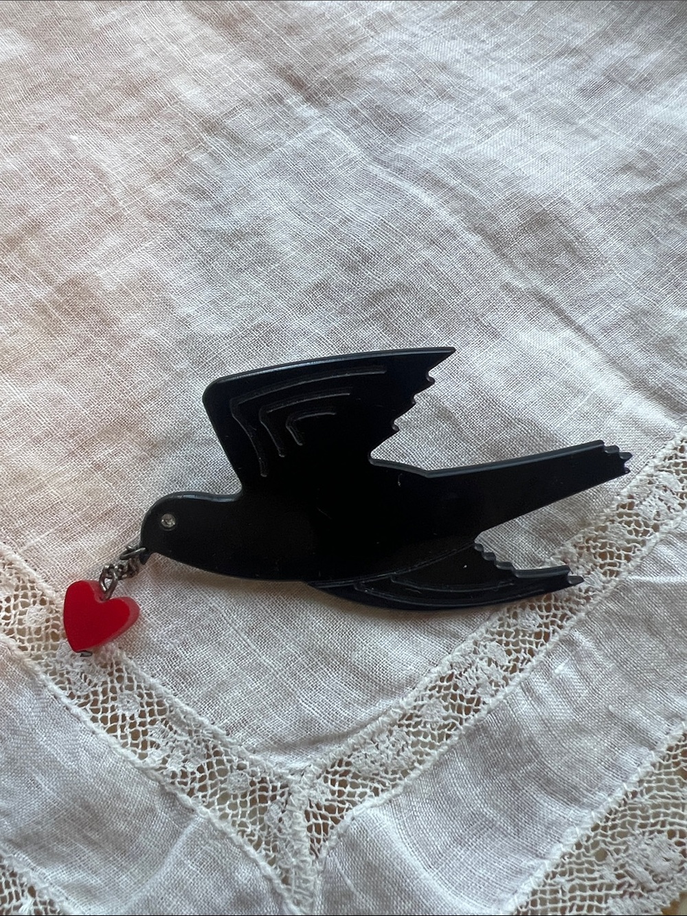 Vintage early 2000s Black Bird brooch with dangling Red Heart rockabilly